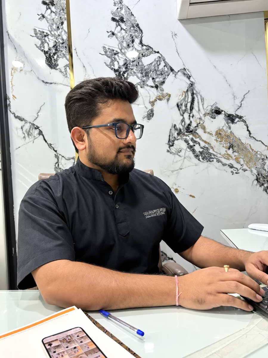 Dr. Atul Bhanu Singla planning a case at his desk